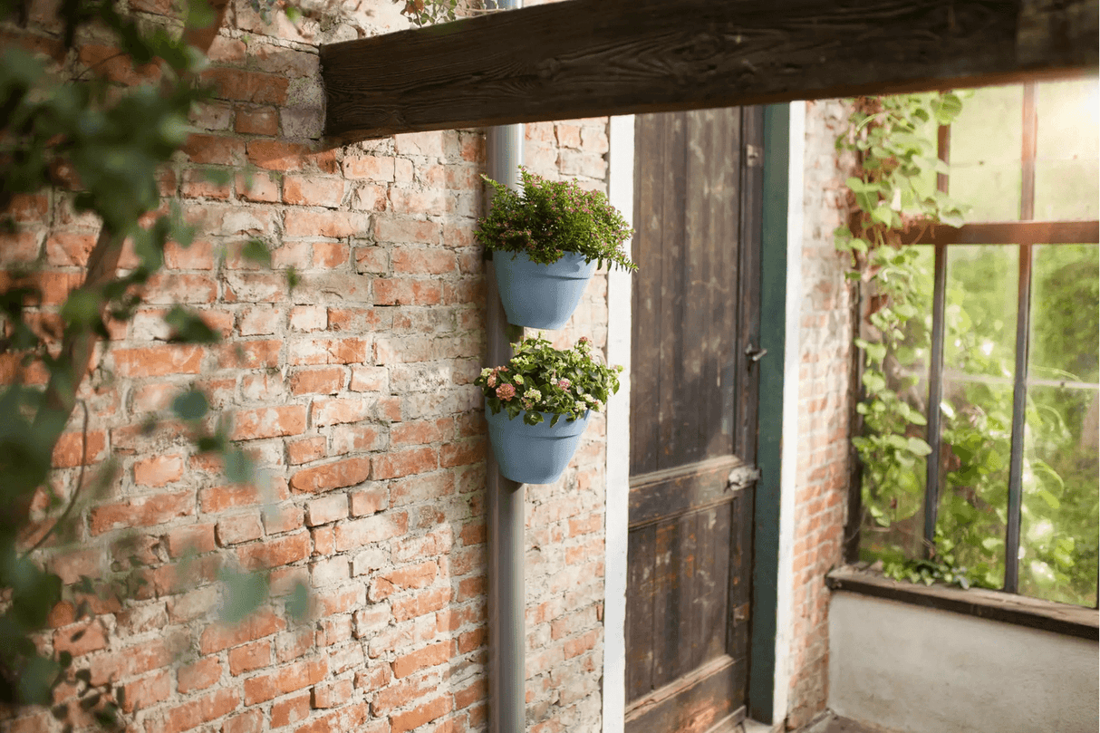 Vibia campana flowerpot for drainpipes