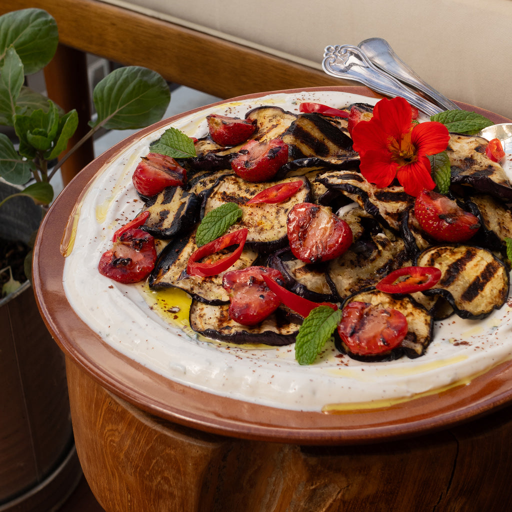 Grilled Eggplant Slices with Feta Cream, Sweet Strawberries, Fresh Chili, and Aromatic Mint