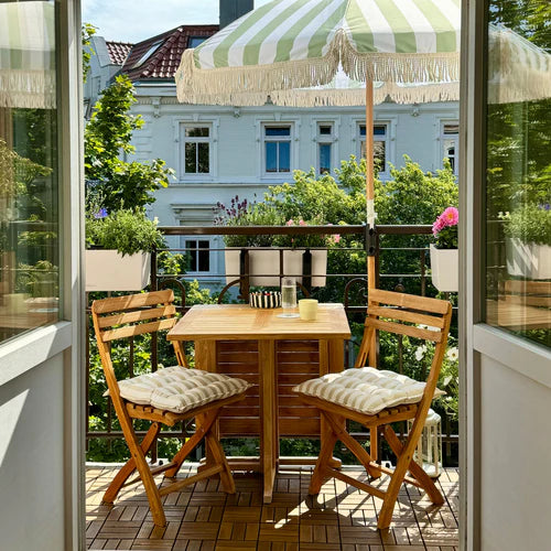 Balcony makeover with a focus on multifunctionality and relaxing decor